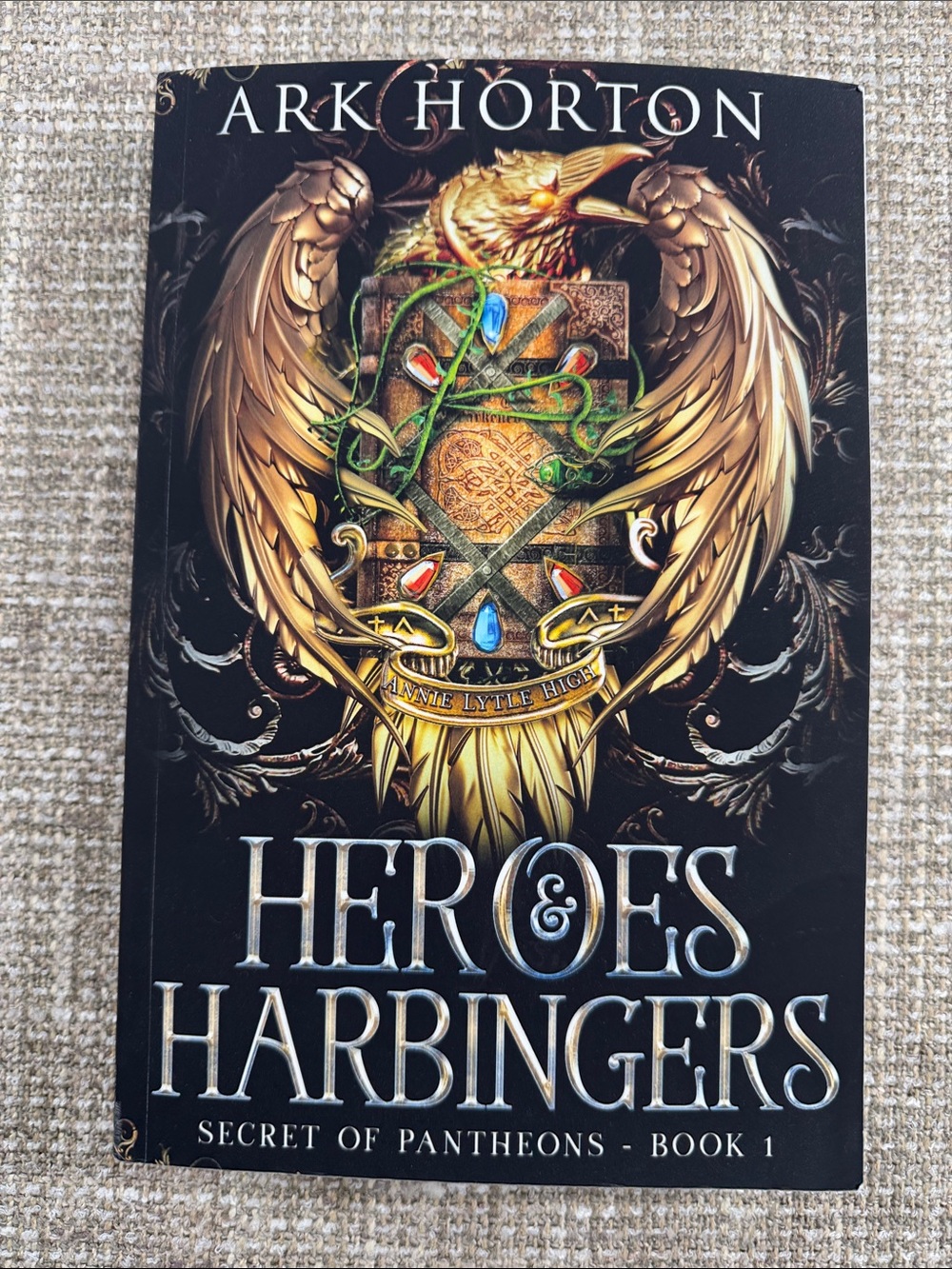 Heroes & Harbingers by Ark Morton - Black Cover with Gold Crest